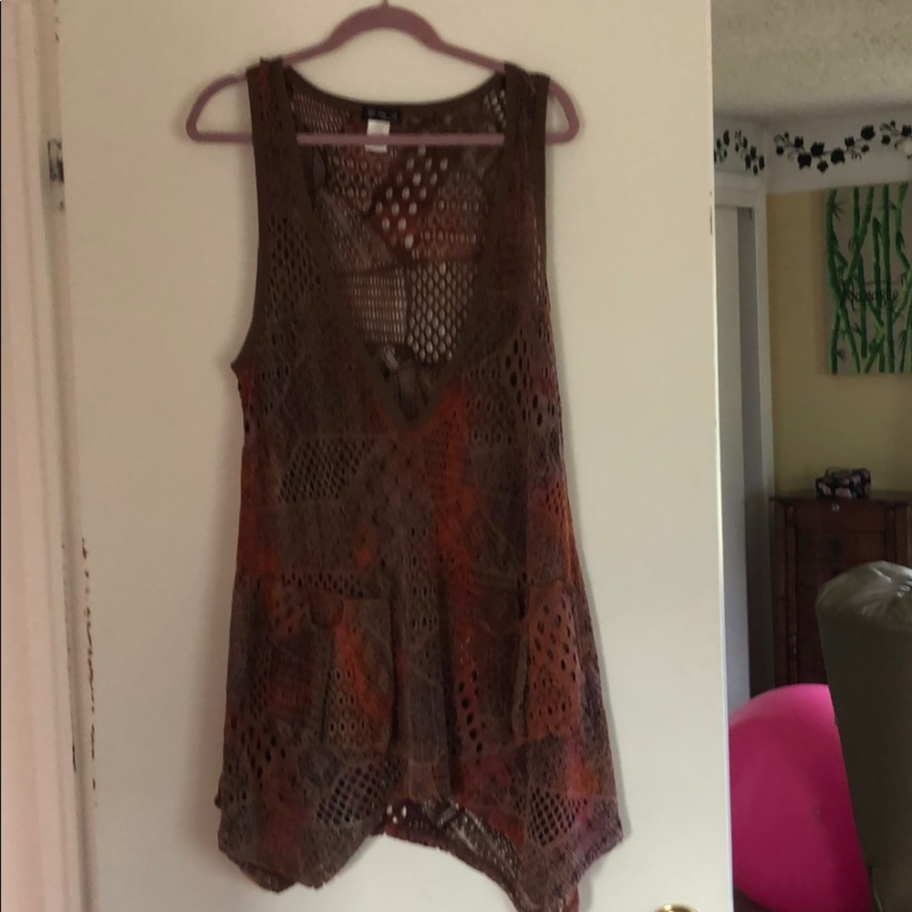 A fall colored vest. Can be dressed up or down.